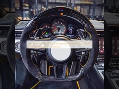P-orsche has updated the steering wheel of the 911 718 B-oxster Ma-can P-anamera