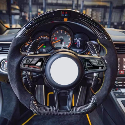 P-orsche has updated the steering wheel of the 911 718 B-oxster Ma-can P-anamera