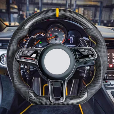 P-orsche has updated the steering wheel of the 911 718 B-oxster Ma-can P-anamera